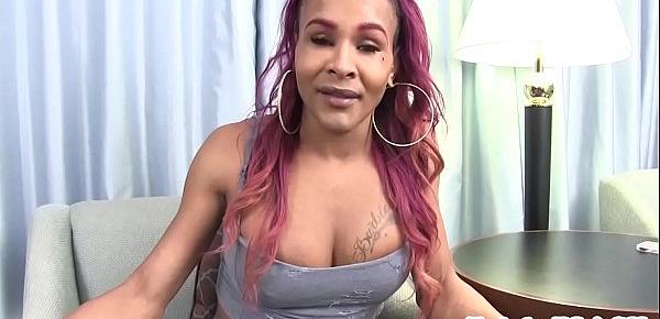  Busty nubian TS tugging her black dong